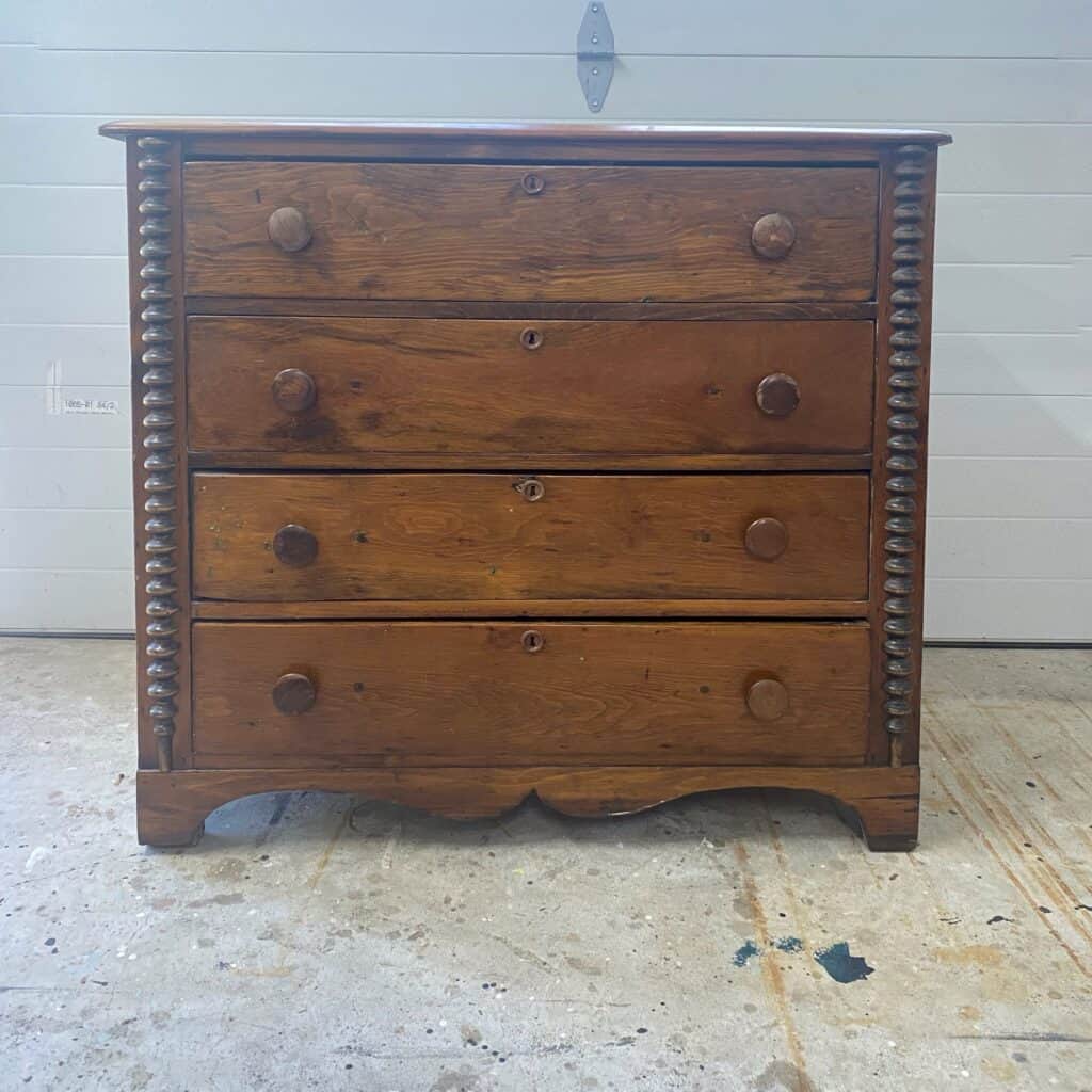 Before photo of antique pine dresser.