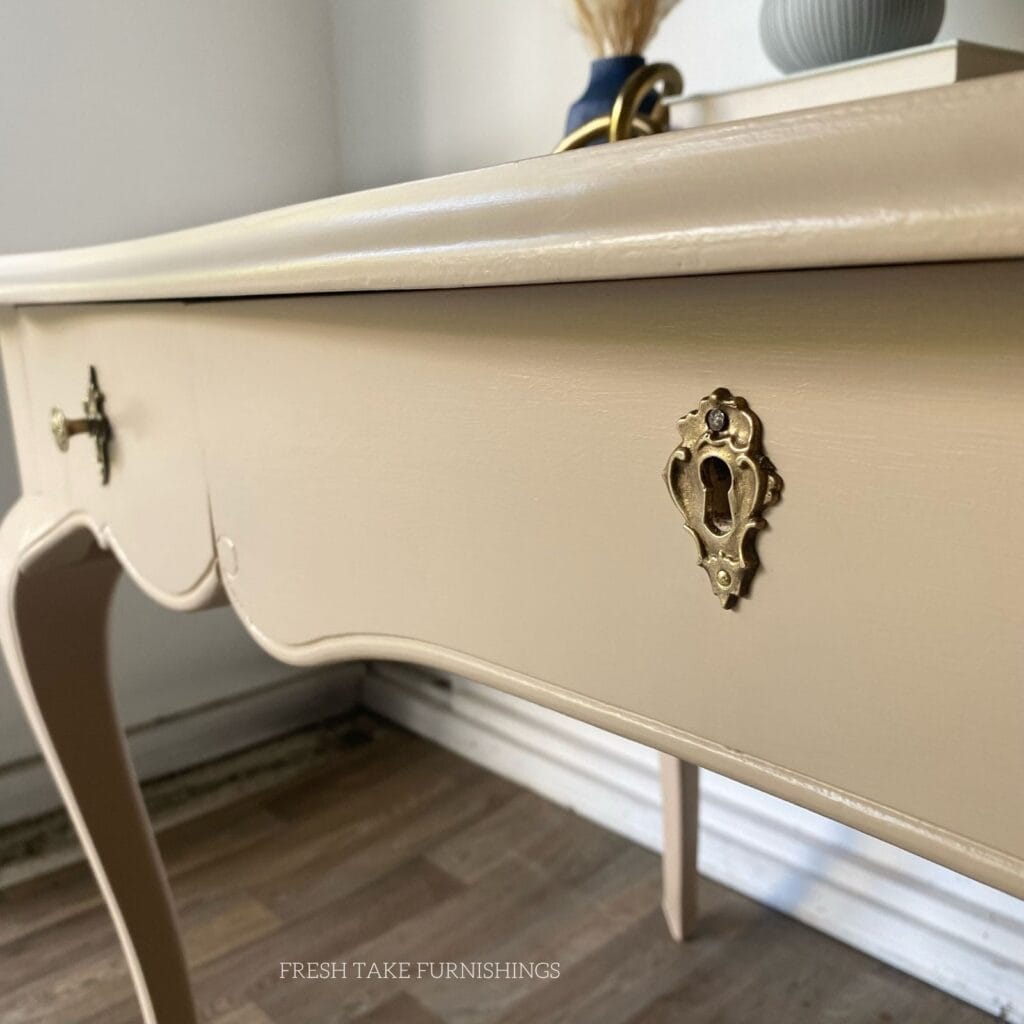 Close up of drawer and hardware of writing desk