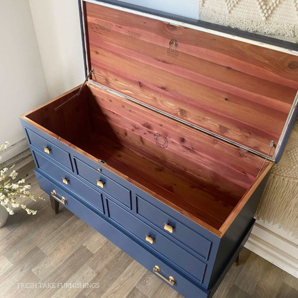 After photo of painted cedar chest with the top open and the inside cedar showing.
