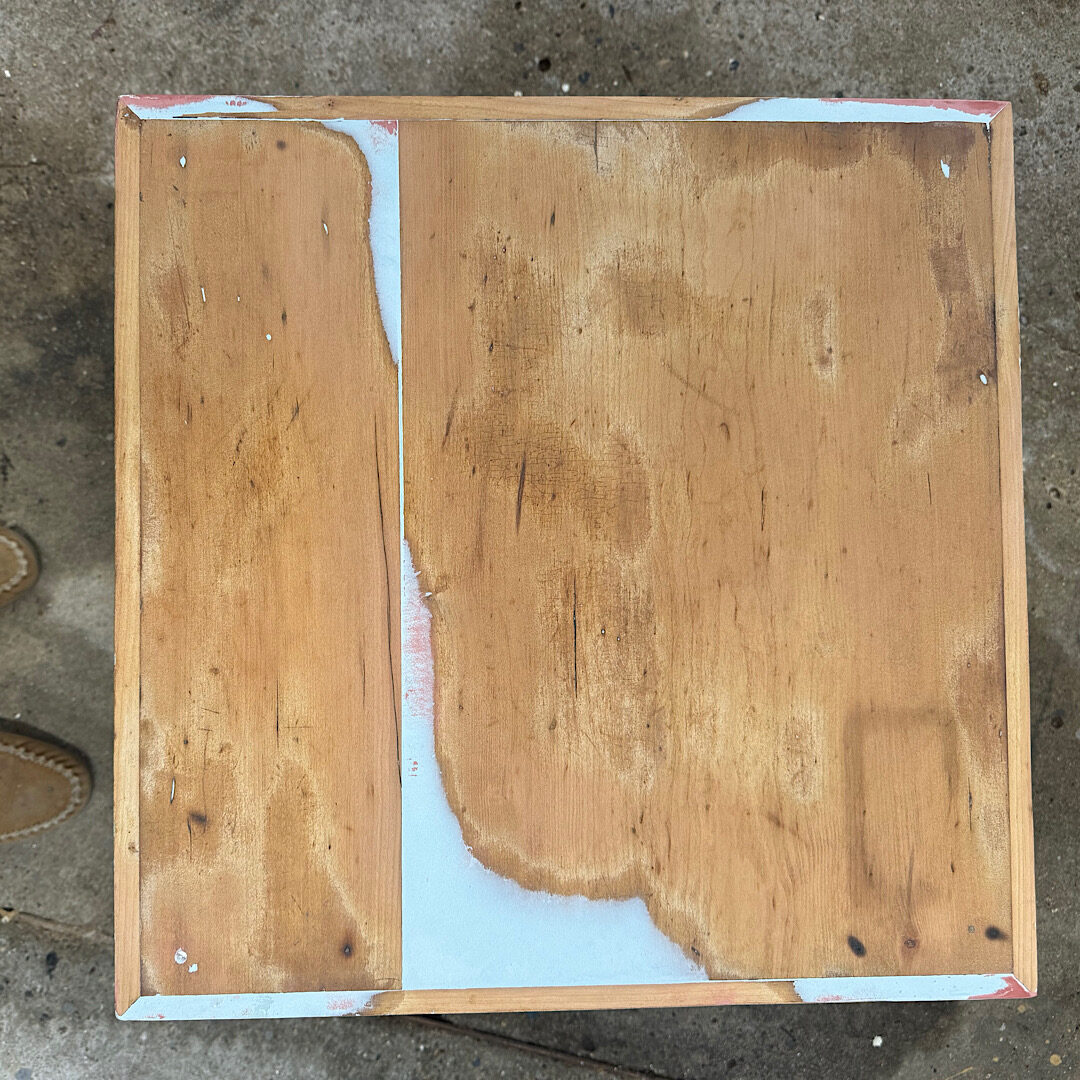Bondo on the top of the table after sanding.