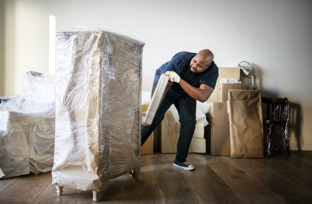 Man moving furntiture