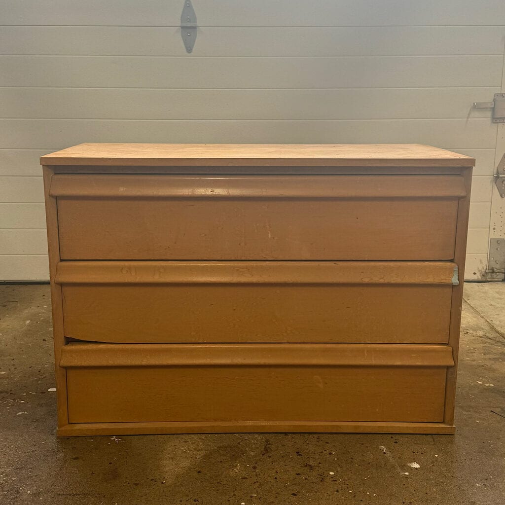 Before photo of MCM three drawer chest of drawers.