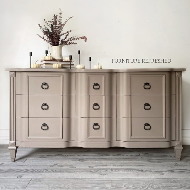 photo of painted tan 9 drawer dresser.
