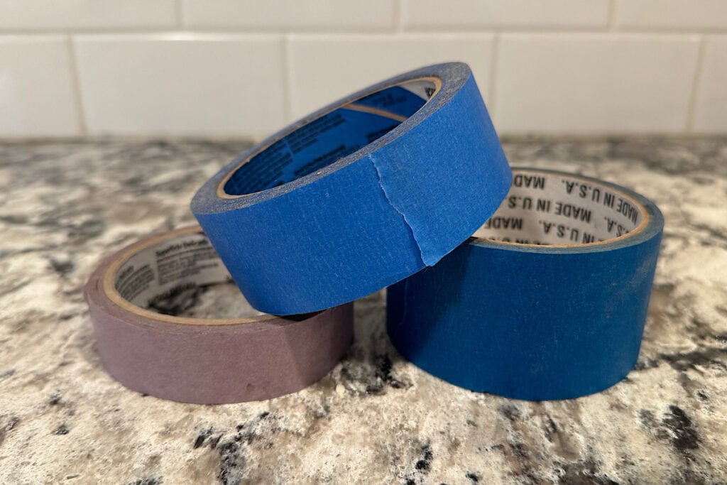 Three rolls of painters tape.