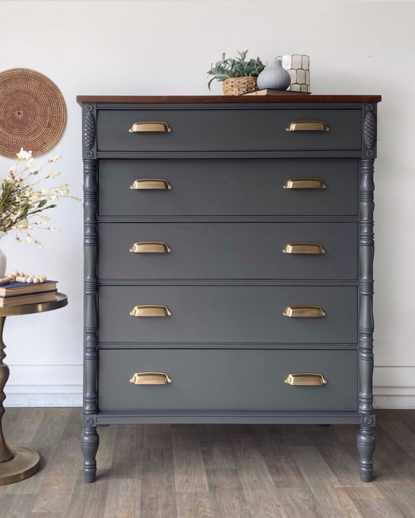 After photo of same dresser with dark grad paint and gold cup pulls.