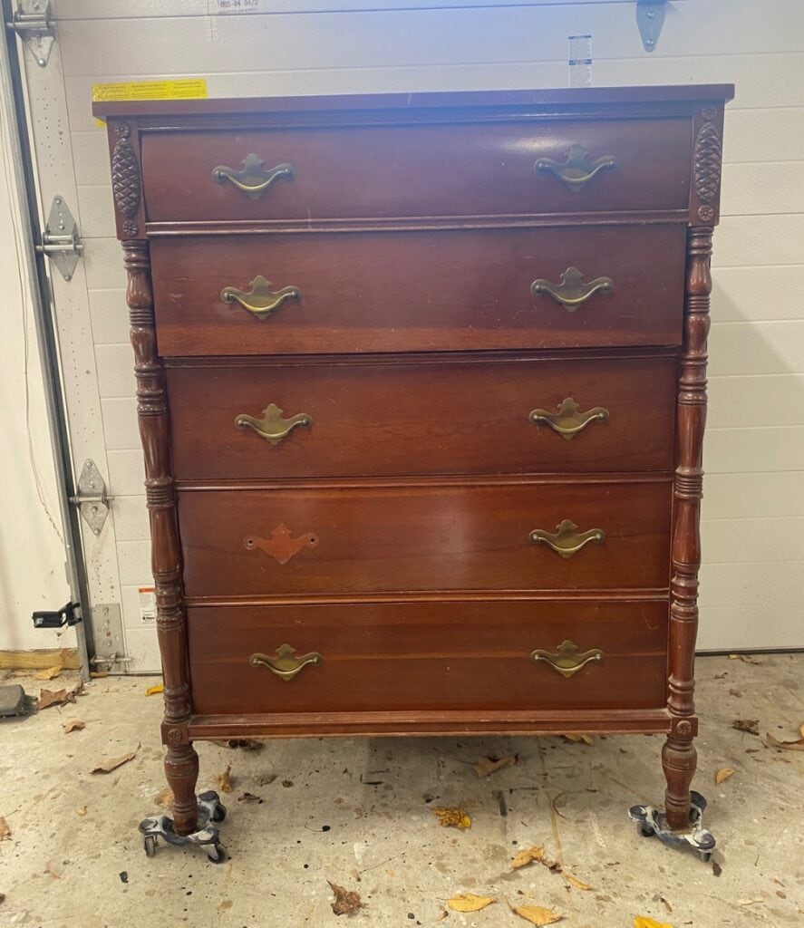 Photo of dresser with old dated Chippendale style hardware.