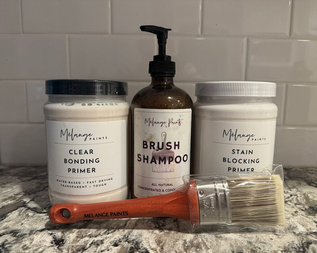 Photo of primers, brush cleaner and brushes sold by Melange Paints.