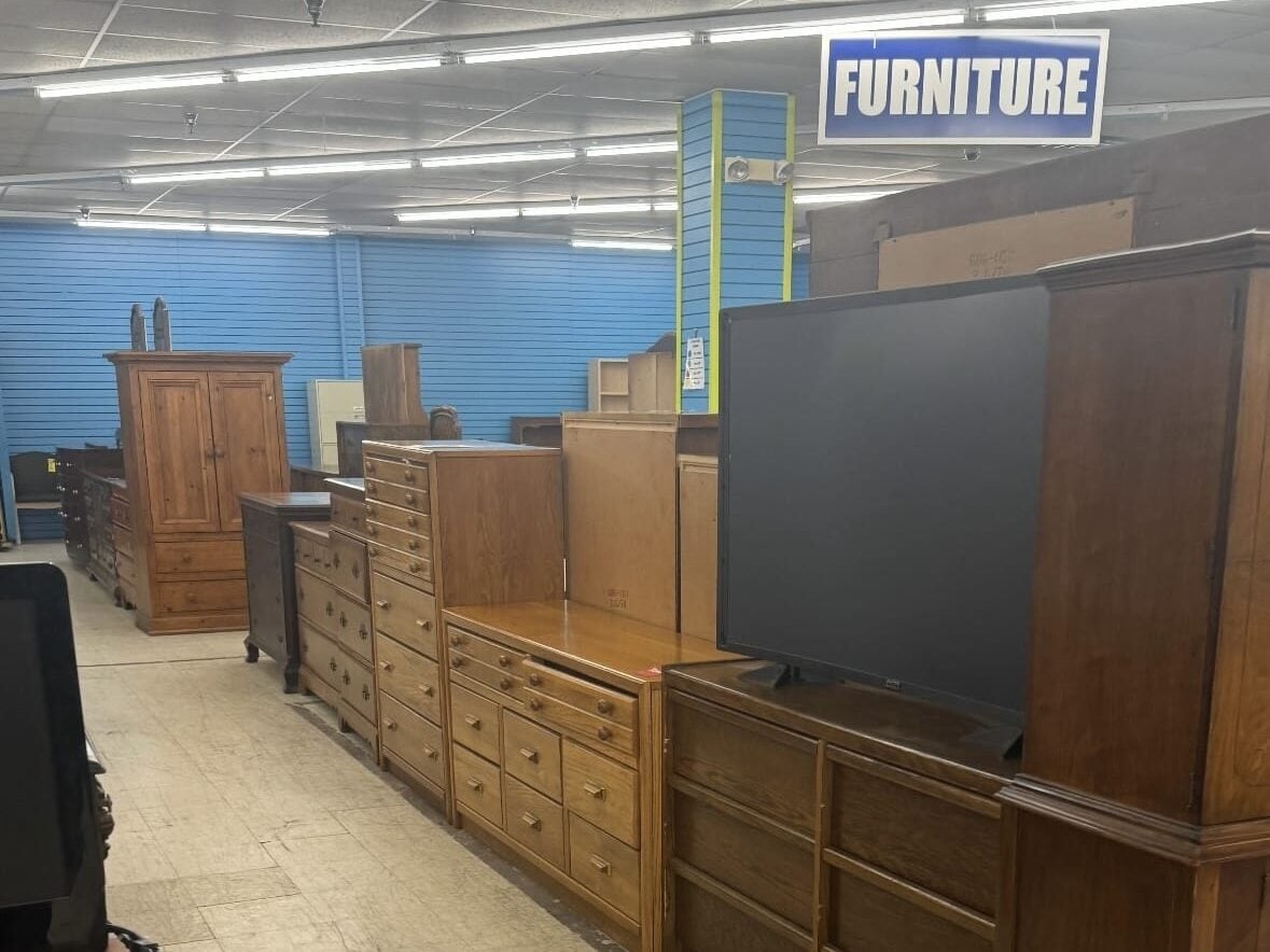 Rows of furniture at a thrift store