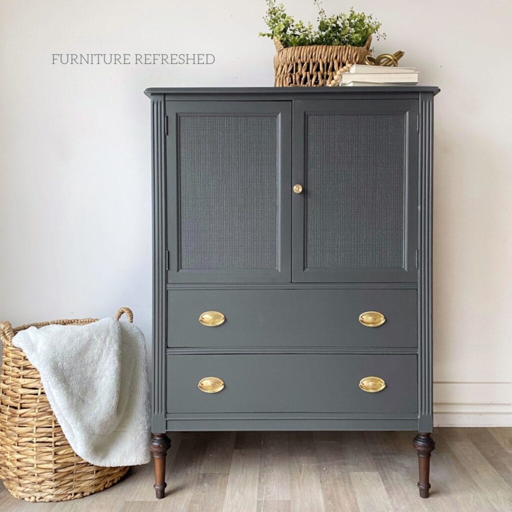 Photo of gray painted armoire with texture added to the doors with paintable wallpaper.