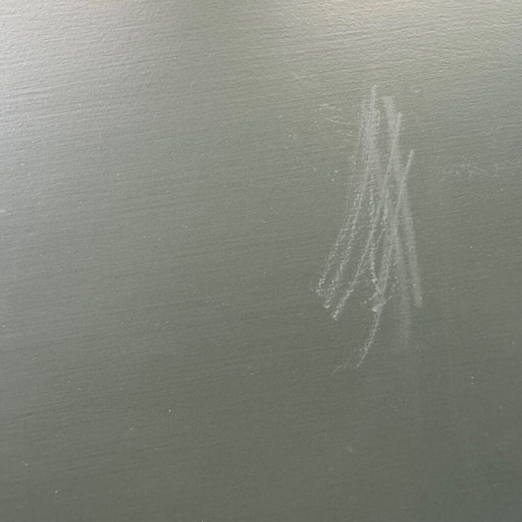 Melange ONE paint with primer did not scratch off.