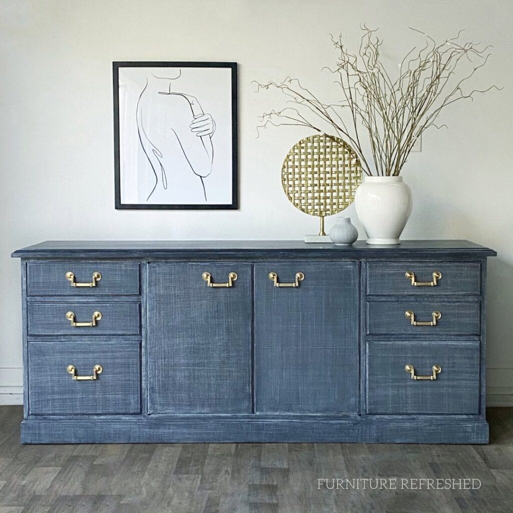 Photo of faux linen finish in navy on a large credenza.