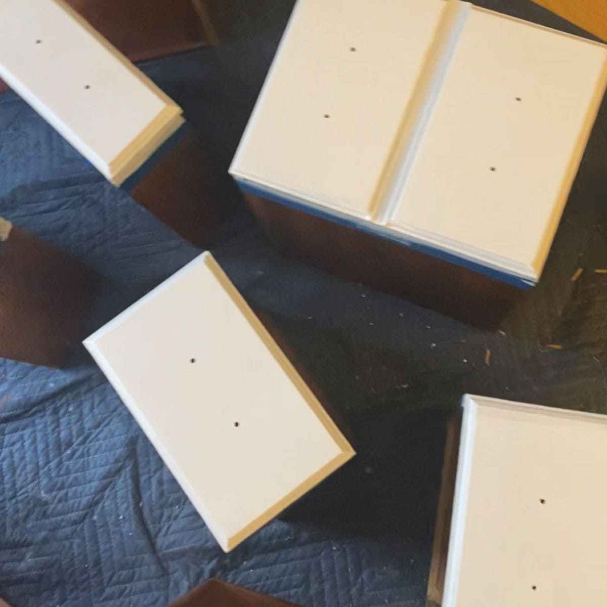 Drawers after three coats of stain blocking primer, pink bleedthrough is gone.