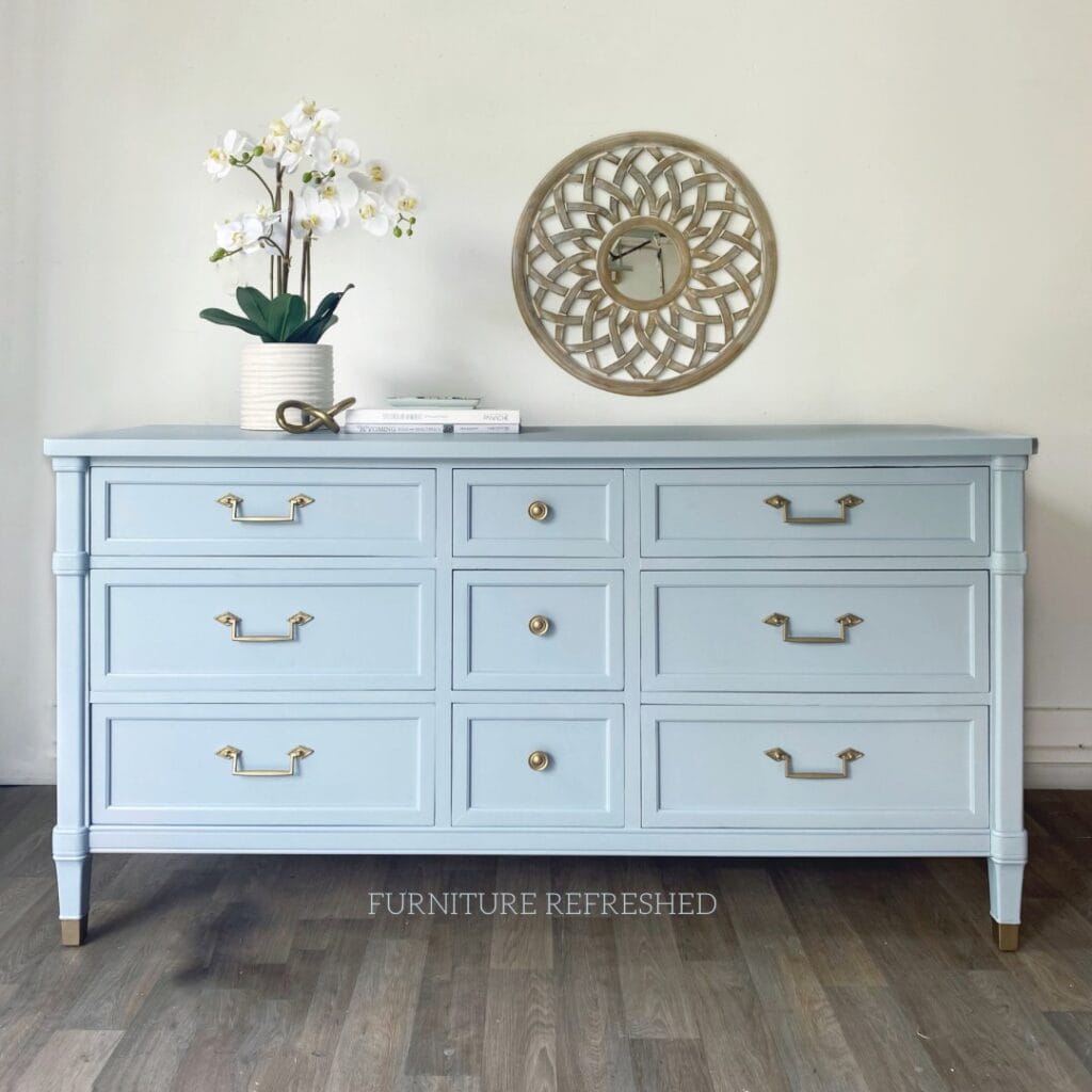 After photo of lowboy dresser painted light blue.