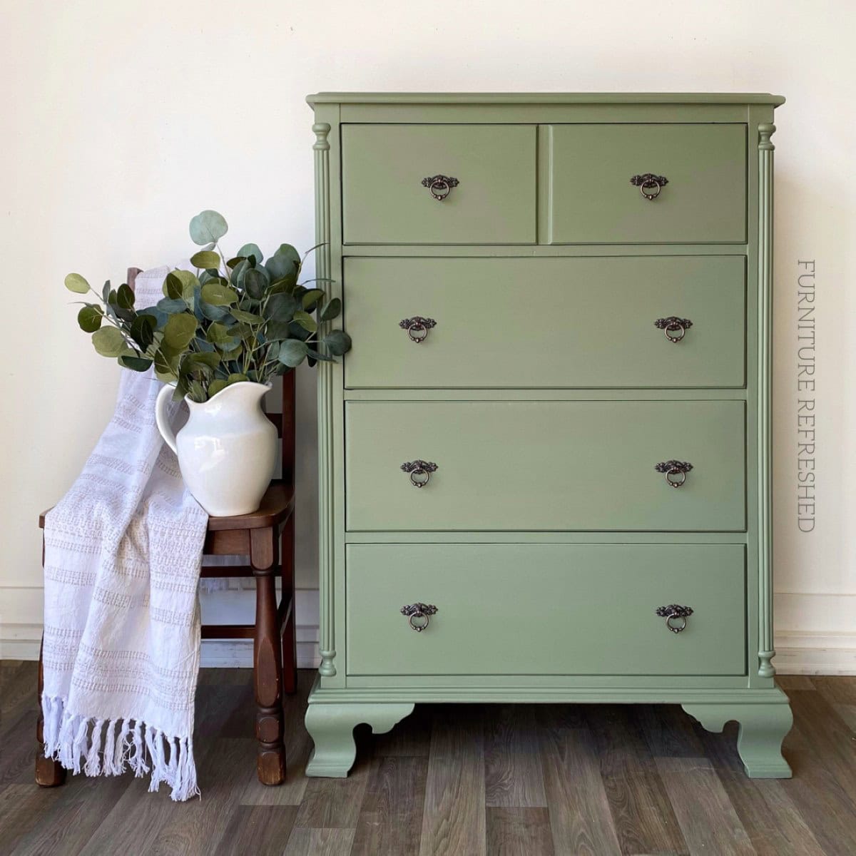 After photo of vintage tallboy dresser painted sage green with new hardware