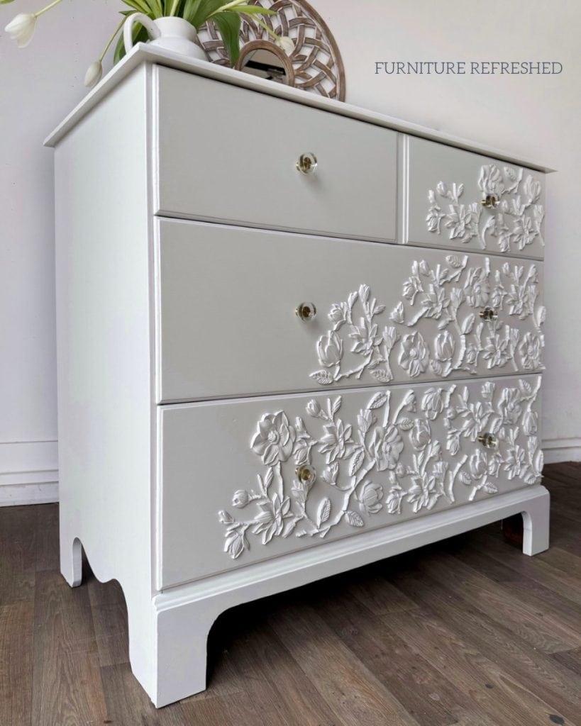 Angled after photo of 3 drawer maple dresser used in this DIY furniture applique makeover.