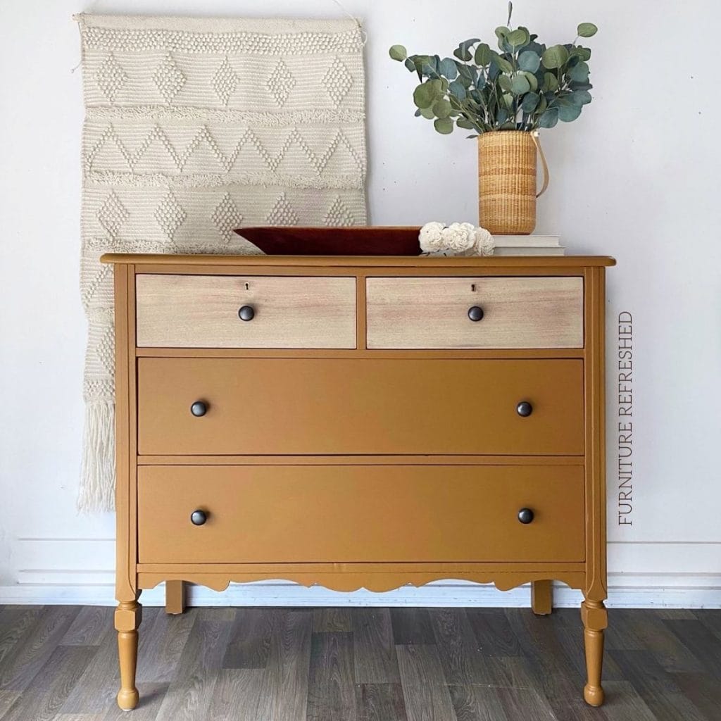 Photo of painted brown dresser.