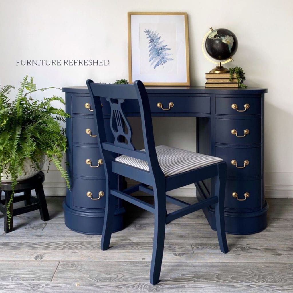 Photo of desk and chair painted navy.