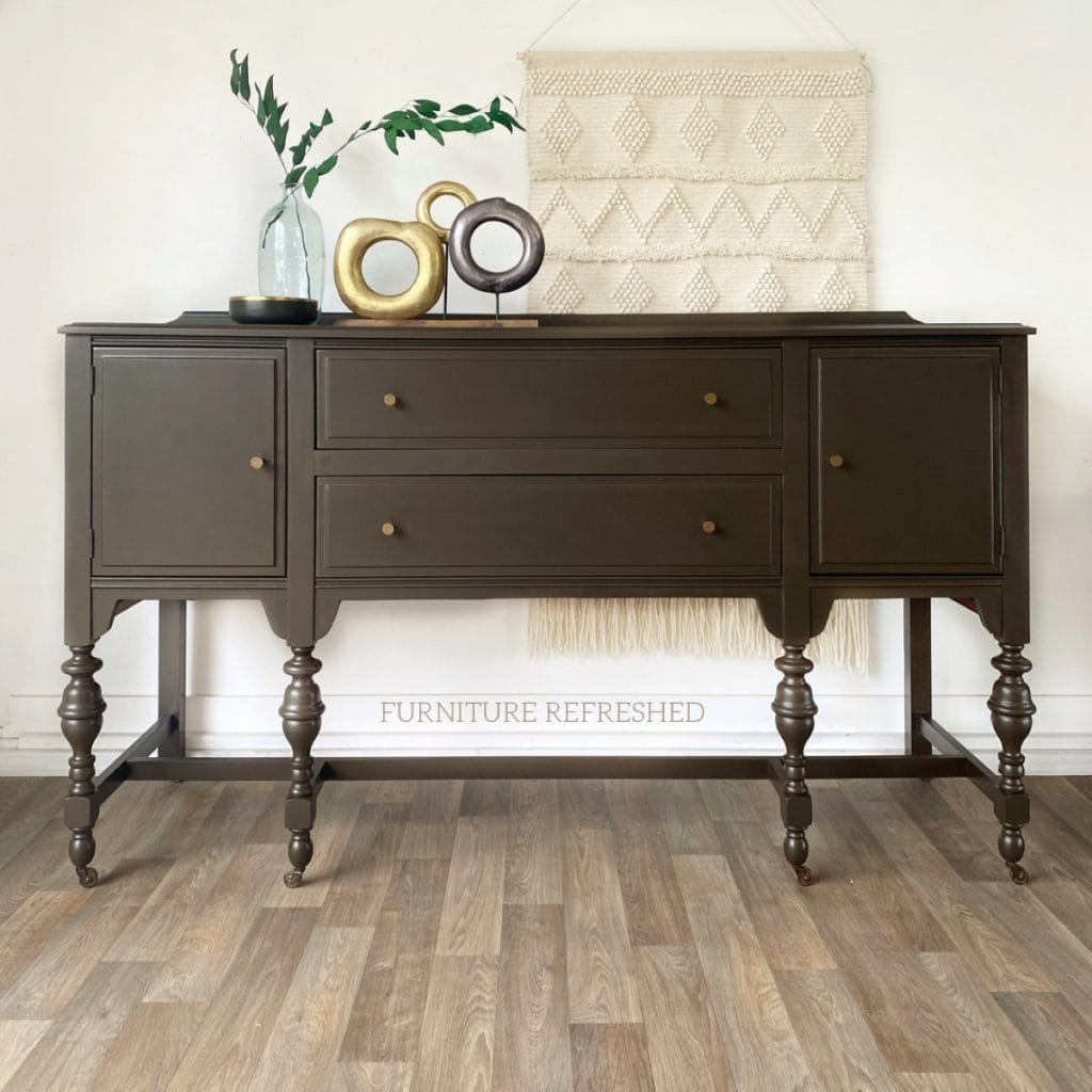 After photo of buffet painted brown with many of the wood details removed.