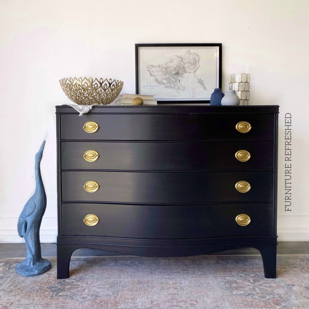 Fully staged black dresser.