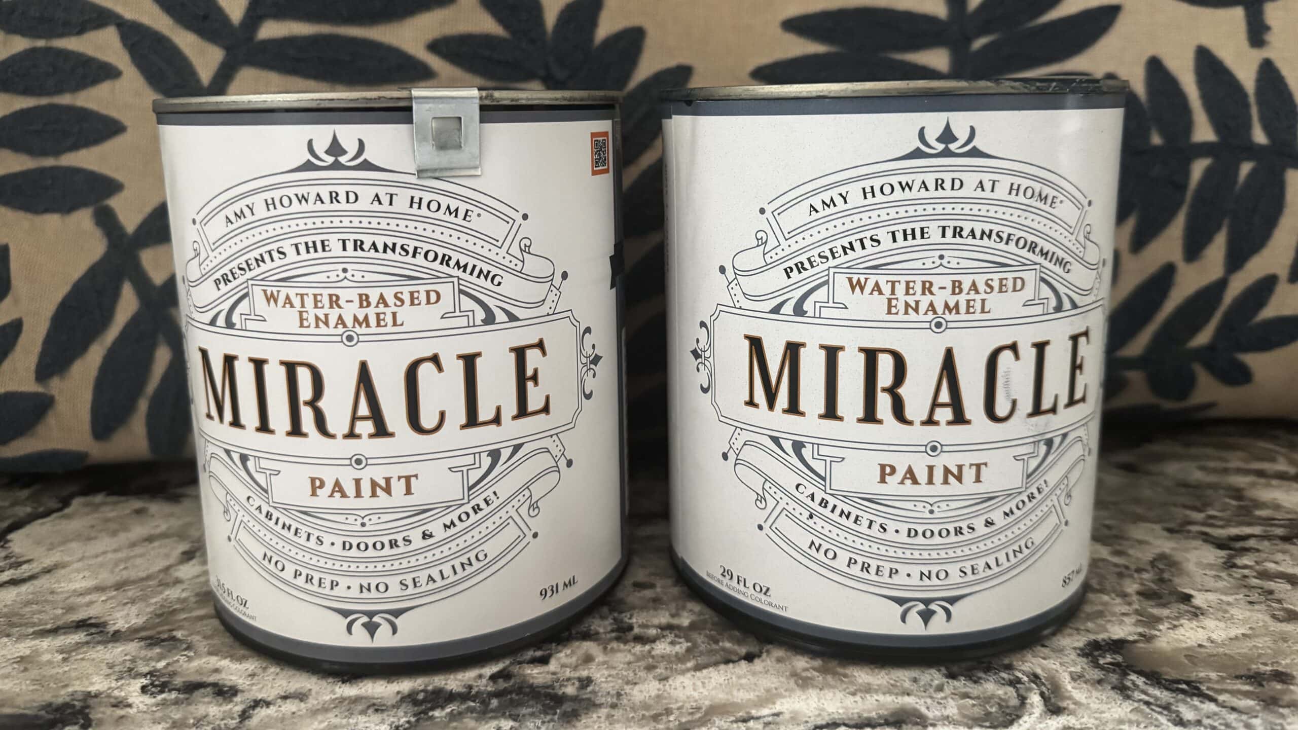 close up of two cans of Amy Howard at Home Miracle Paint