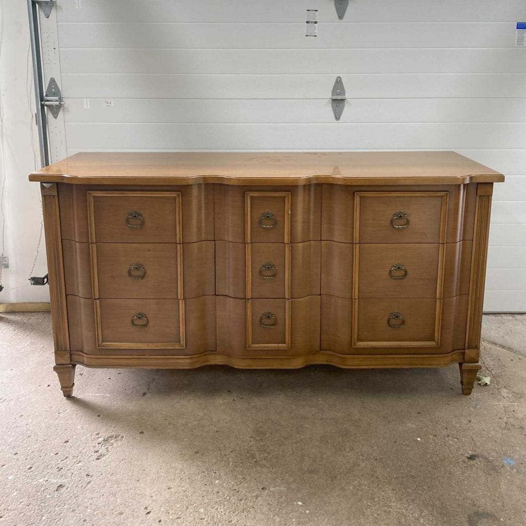 Before photo of Kent Coffey dresser with a light wood finish.