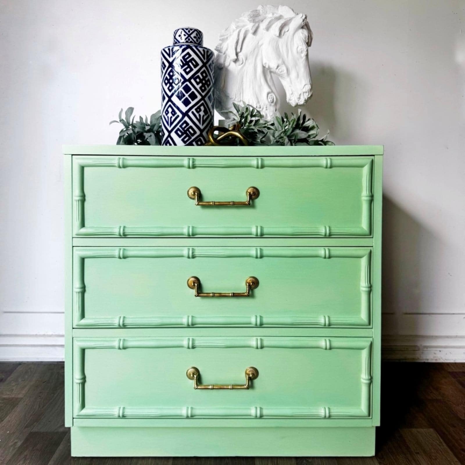 After photo of faux bamboo dresser painted in bright green, Mint Julep by Shackteau Interiors Milk Paint.