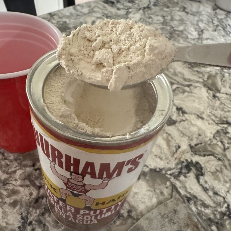 A close up of Durham's Rock Hard Water Putty powder.