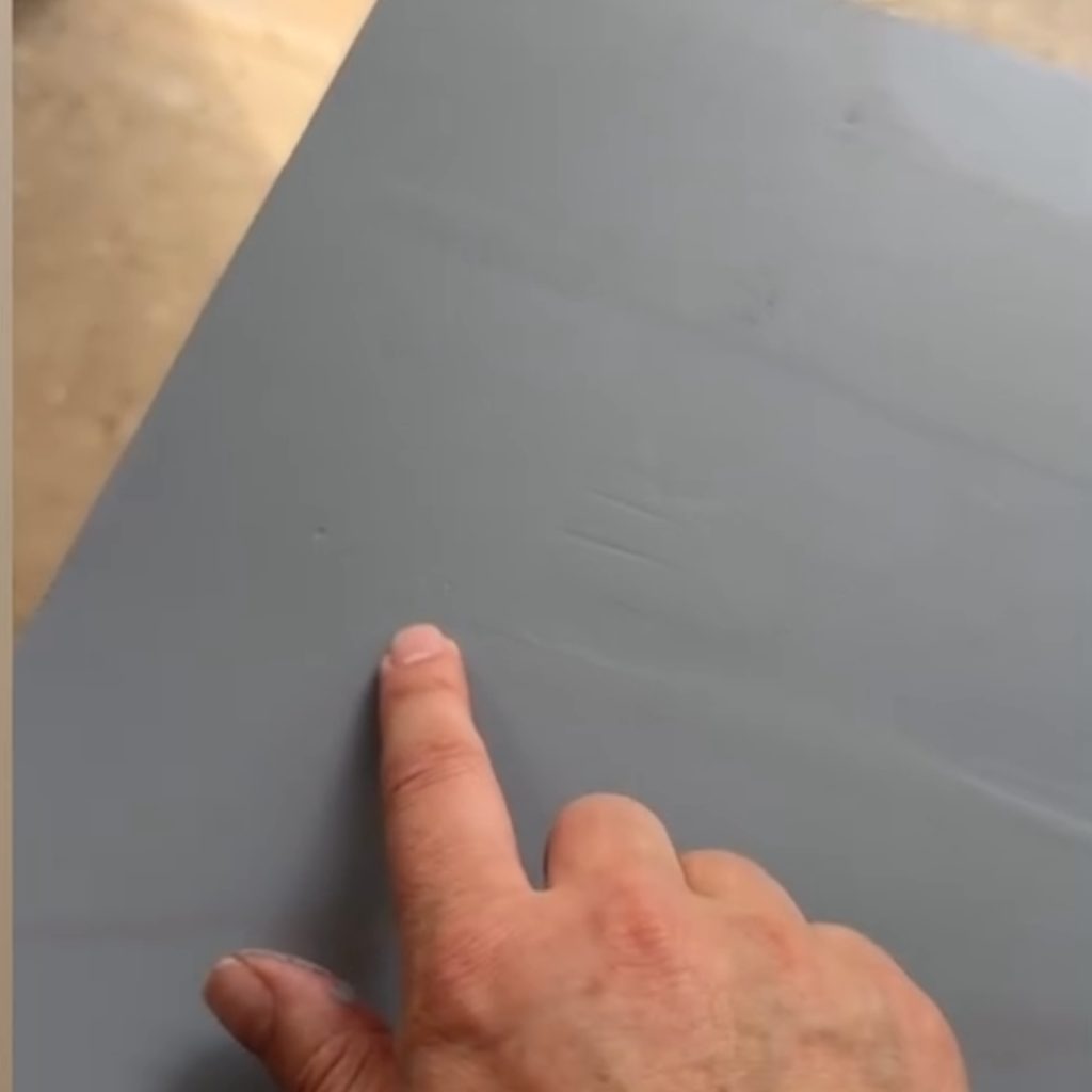 Close up of primed area after wood fillers were used.