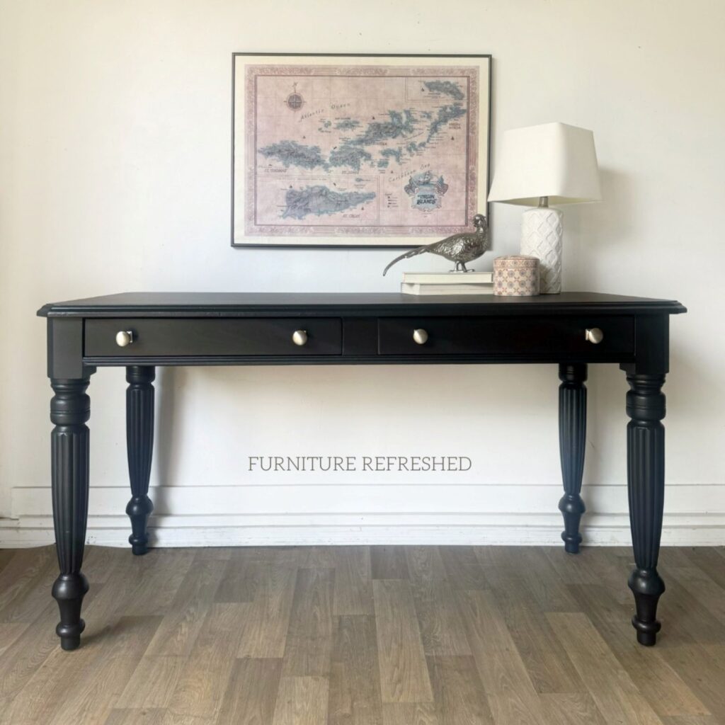 After photo of pine wood desk painted black.