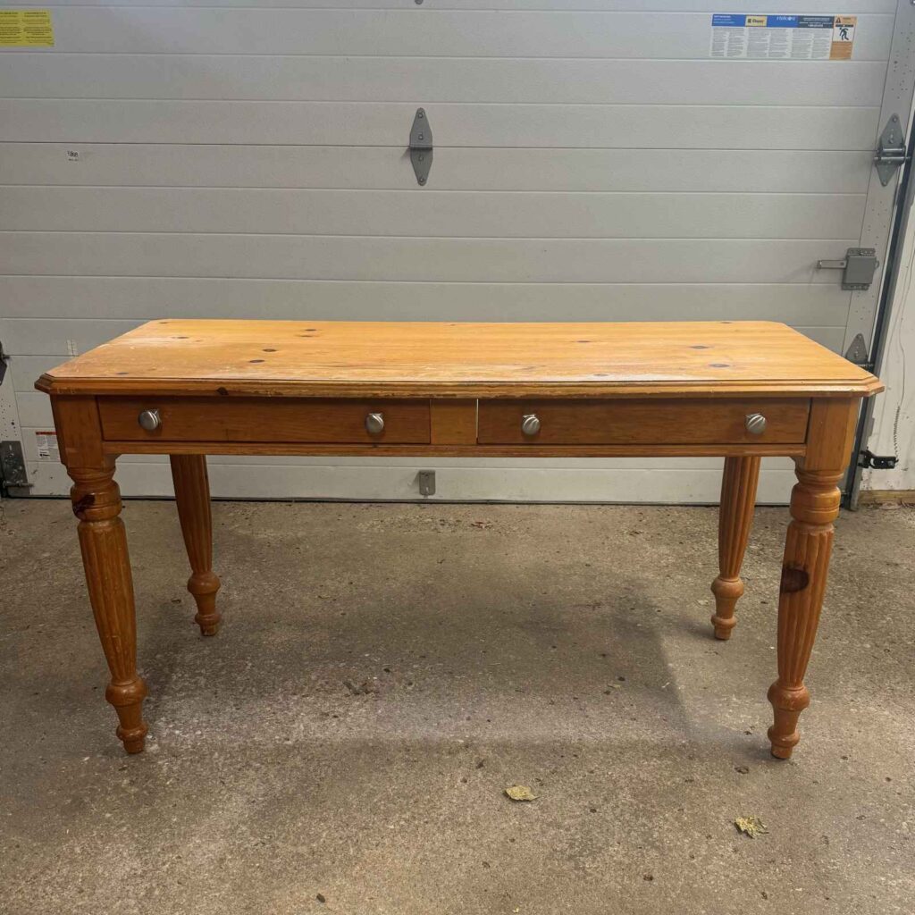 Before photo of pine wood writing desk.