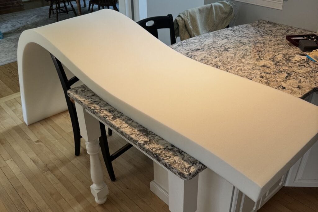 Long roll of high density foam that I will be cutting into cushion size.