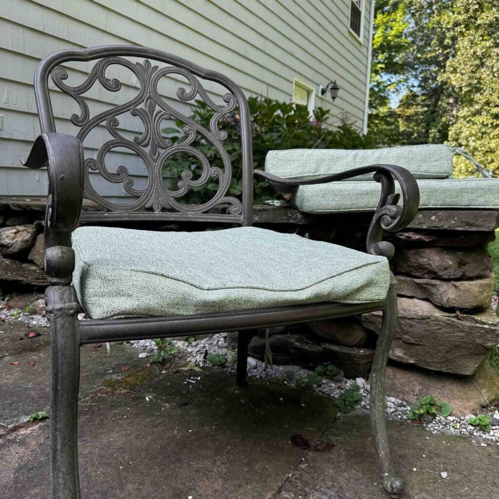 Before photo of old worn out patio chair cushion.