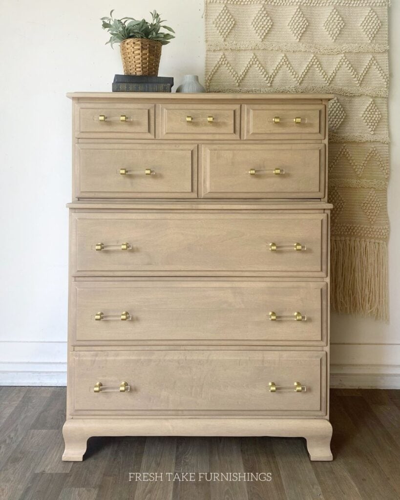 Photo of maple dresser that has been paint washed for a rash wood look.
