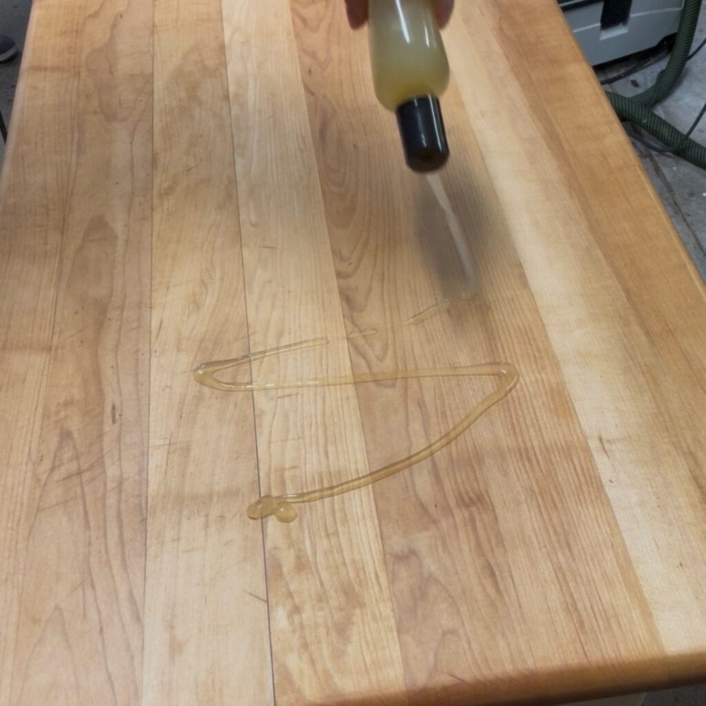 Apply Howard's foodsafe butcher block conditioner to the butcher block top.