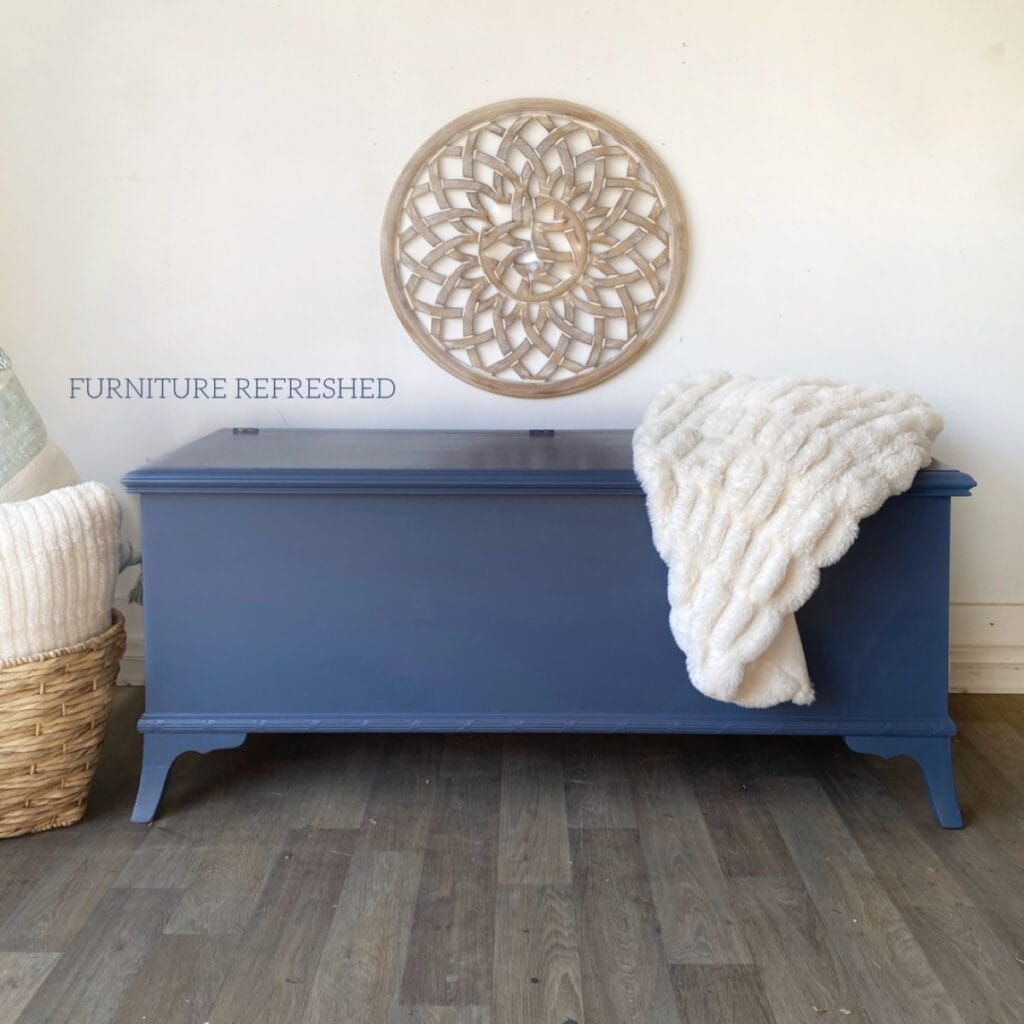 After photo of cedar chest with dated details removed and painted blue.