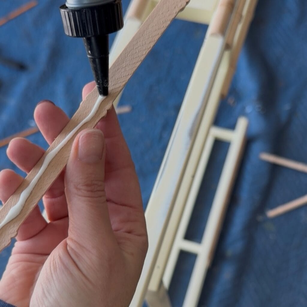 Adding glue to the bamboo trim