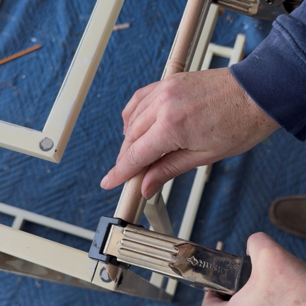 Clamping the bamboo trim onto the table.