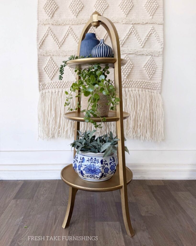 After photo of metallic spray painted plant stand.