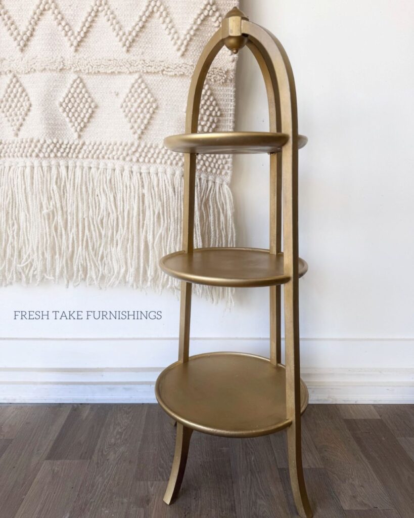 After photo of metallic spray painted plant stand.